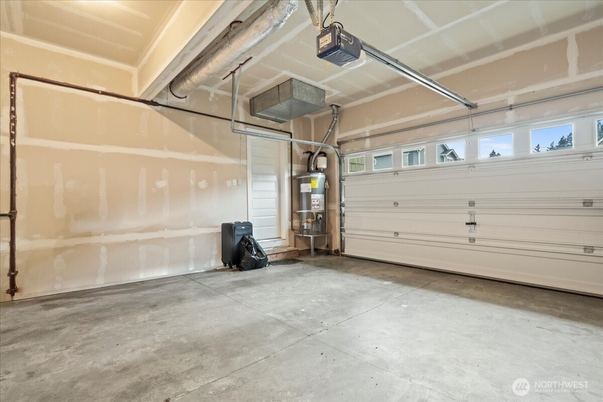 18213 36th Avenue Southeast Bothell, WA 98012 - Photo 29 of 34 a view of a room with rack on the wall