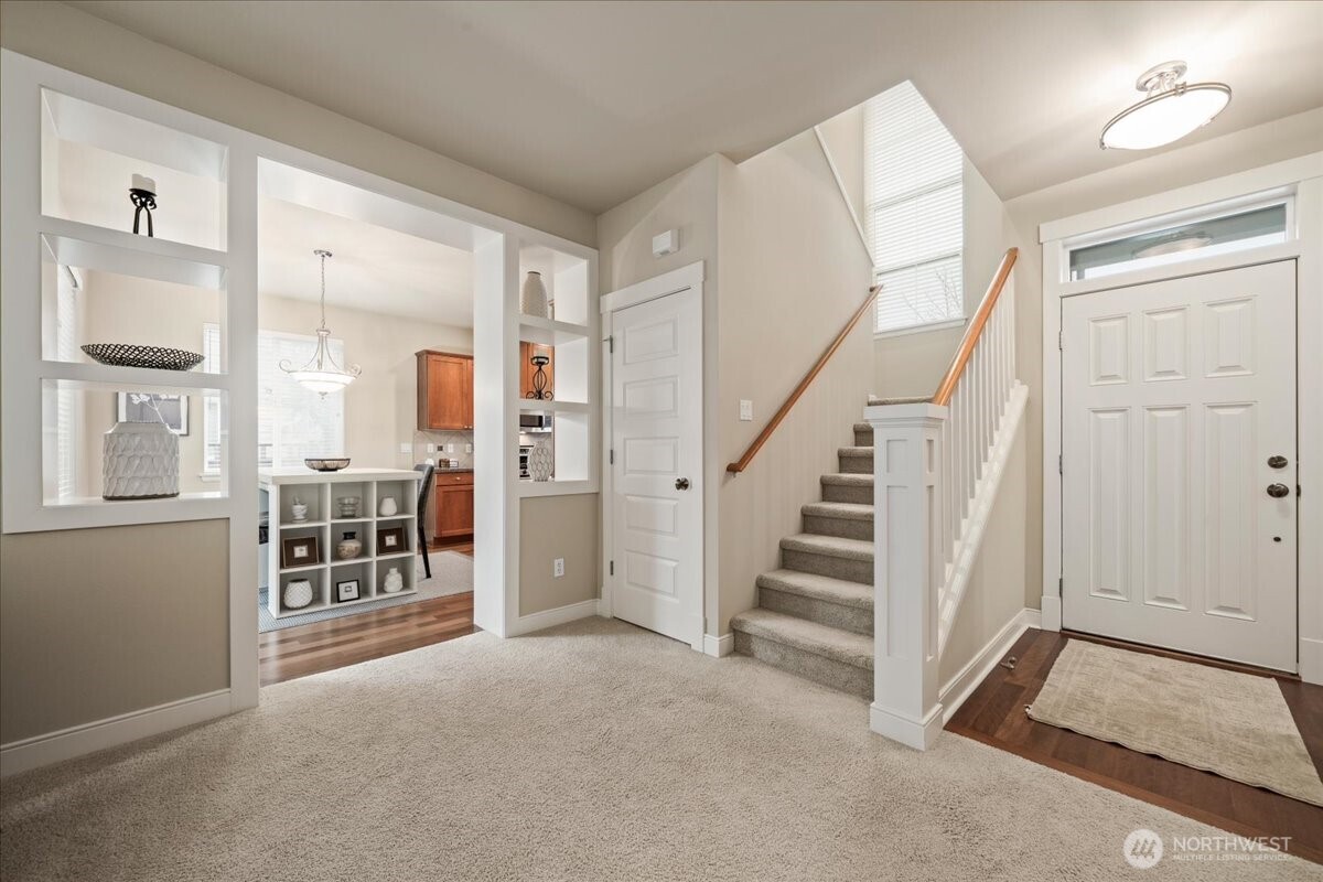 18213 36th Avenue Southeast Bothell, WA 98012 - Photo 7 of 34 a view of livingroom with stairs and furniture