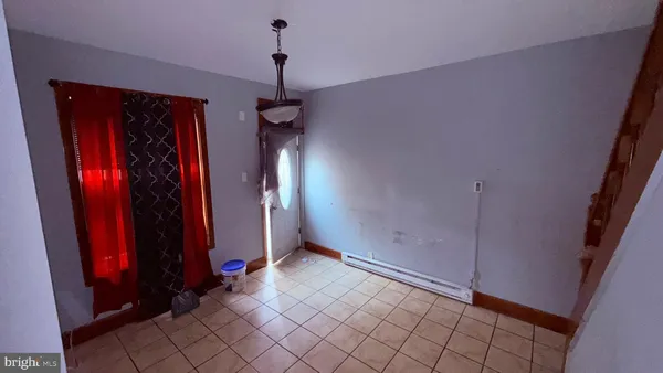 a view of a hallway with closet