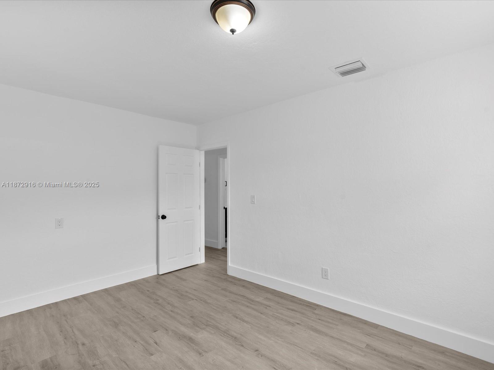 5365 Southwest 97th Court Miami, FL 33165 - Photo 31 of 51 a view of an empty room