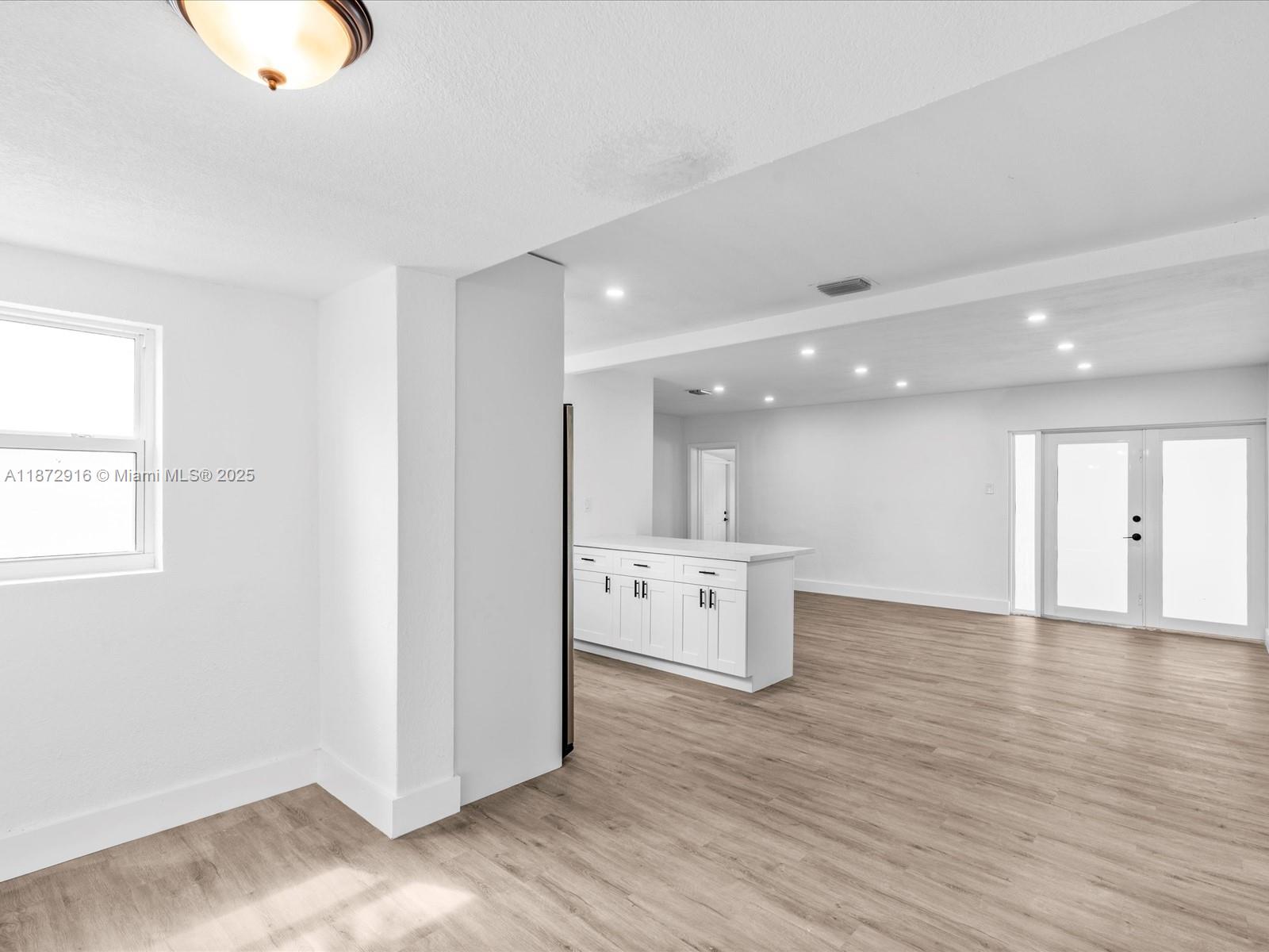 5365 Southwest 97th Court Miami, FL 33165 - Photo 39 of 51 a view of a kitchen with wooden floor