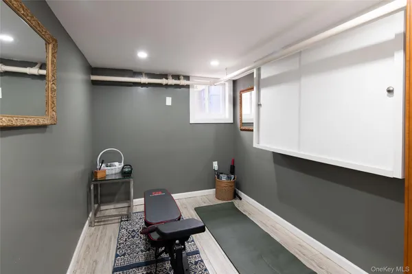a utility room with sink dryer and washer