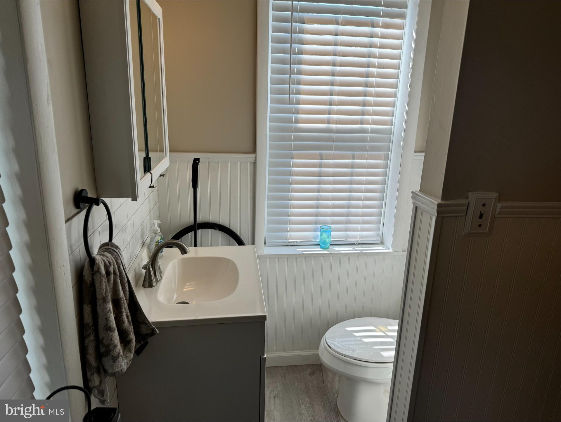 152 Stein Road Ashland, PA 17921 - Photo 17 of 40 a bathroom with a granite countertop toilet sink and mirror