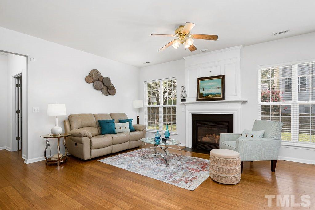 109 Huntersville Road Morrisville, NC 27560 - Photo 11 of 30 Family Room with Fire Place, Lots of Light from Windows