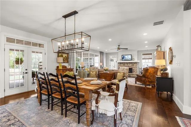 a view of a patio with a table chairs and a table
