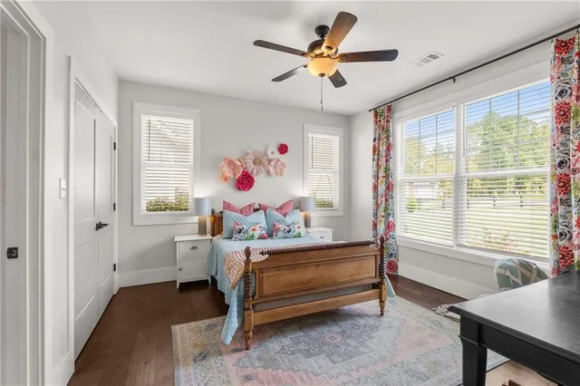 a bed room with a bed and a window