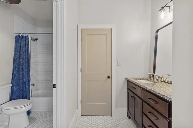 a kitchen with cabinets appliances and a counter space