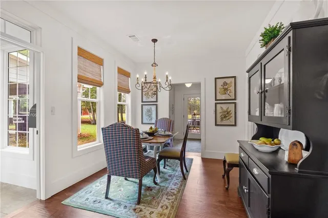 an aerial view of a house with a yard basket ball court and outdoor seating