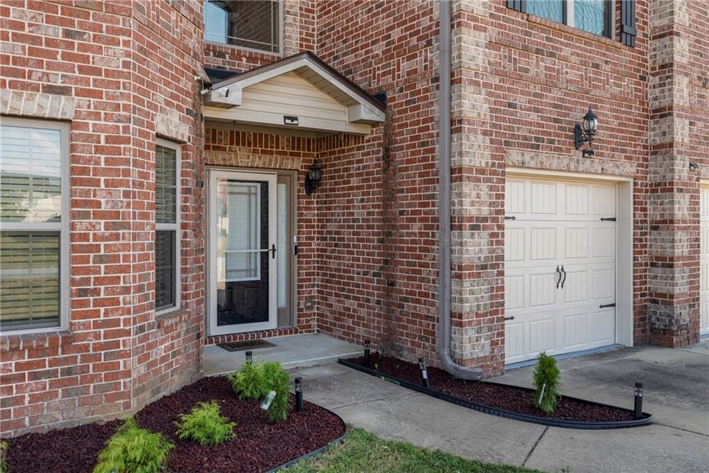 12 Juno Street Fort Mitchell, AL 36856 - Photo 41 of 43 Entrance to property with brick siding and a garage