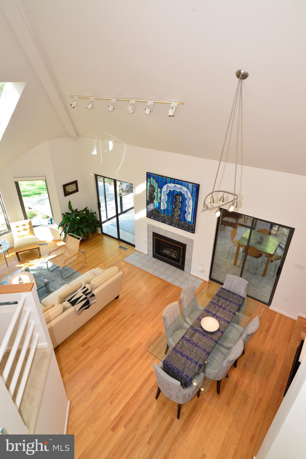 2262 Compass Point Lane Reston, VA 20191 - Photo 16 of 48 a living room with furniture and a wooden floor