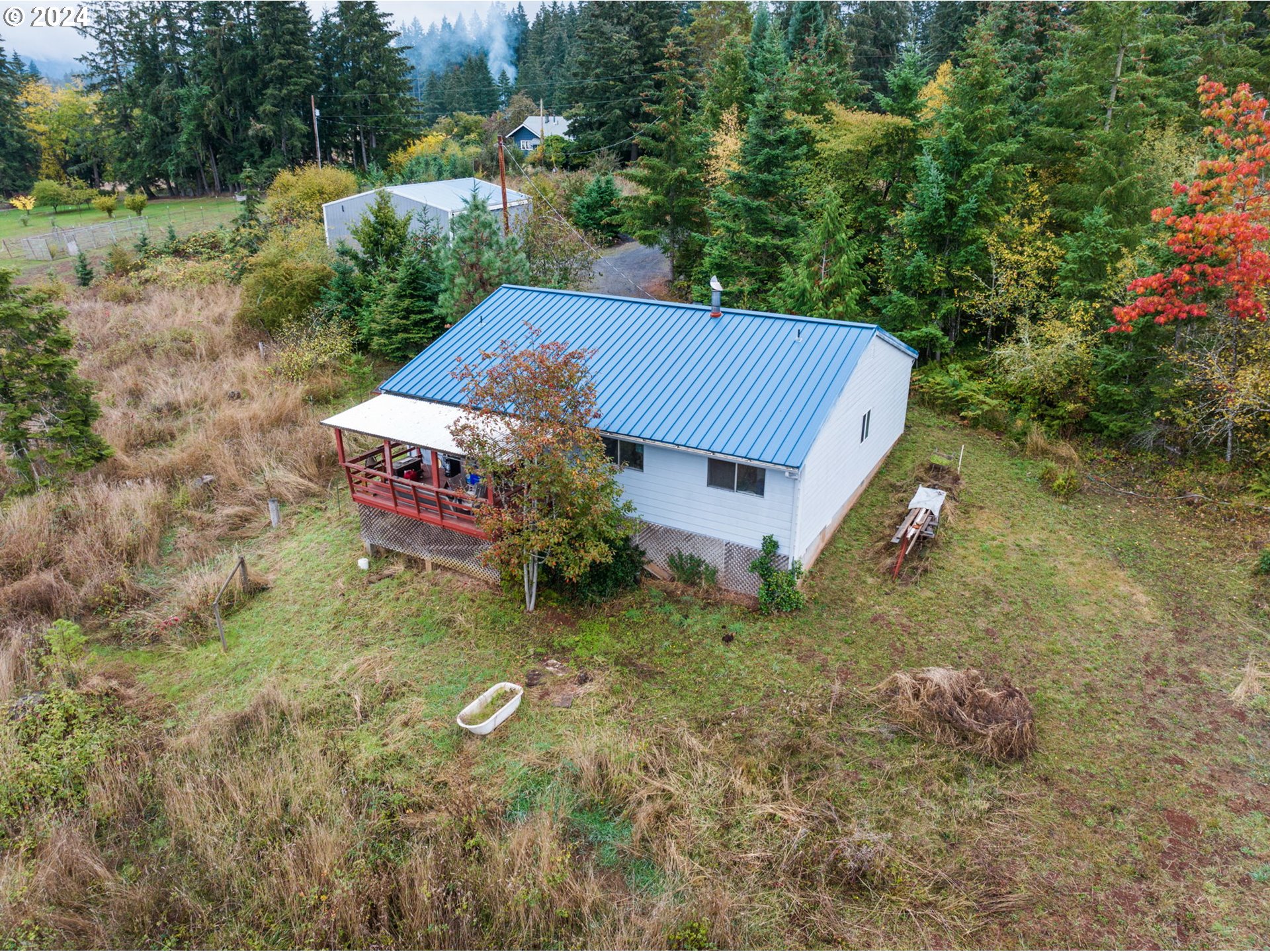 19733 South Harper Road Colton, OR 97017 - Photo 5 of 48 a aerial view of a house with a yard