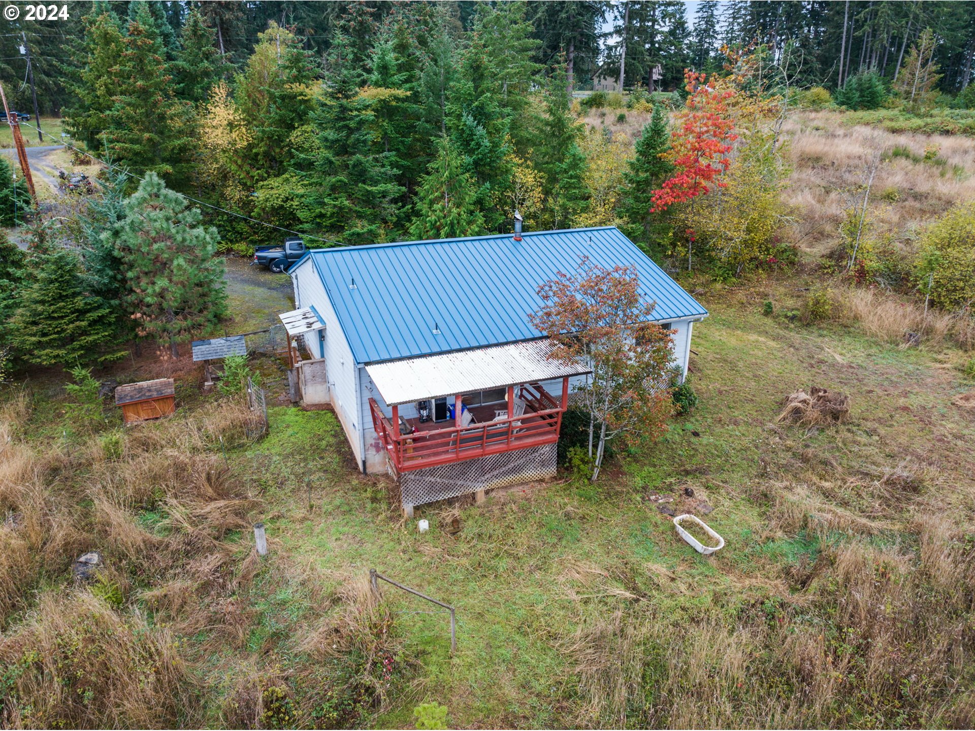19733 South Harper Road Colton, OR 97017 - Photo 6 of 48 an aerial view of a house with yard and lake view