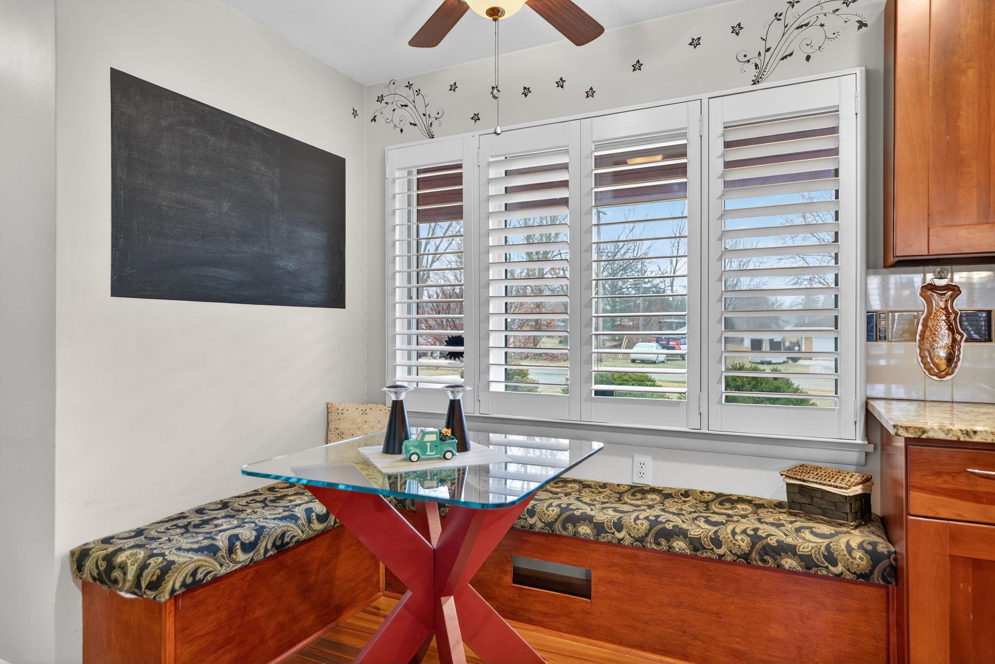 7681 Mill Road Rockford, IL 61108 - Photo 17 of 43 a living room with furniture and a chandelier