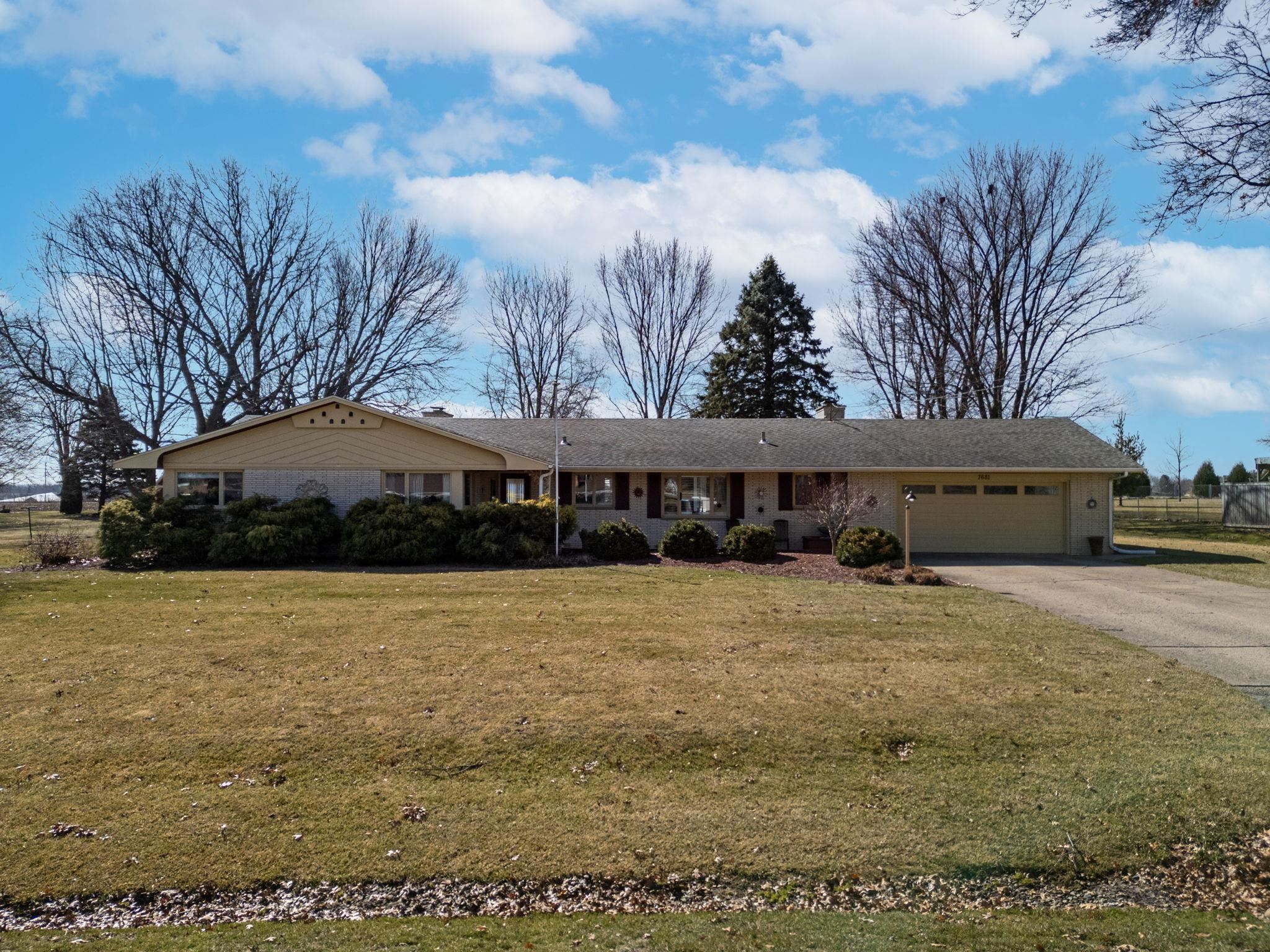 7681 Mill Road Rockford, IL 61108 - Photo 2 of 43 a view of a house with a yard