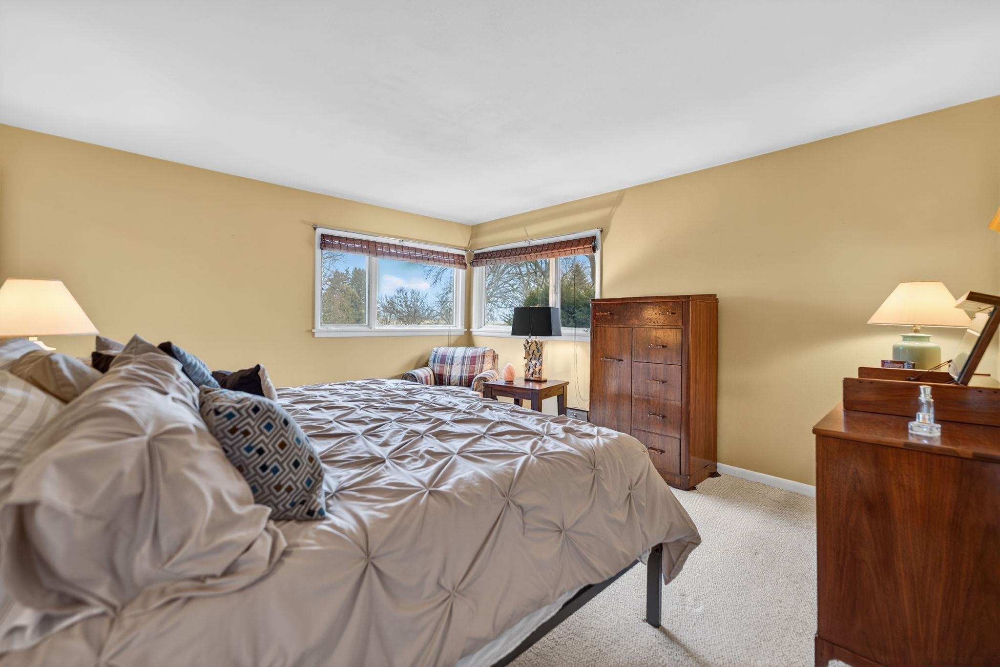 7681 Mill Road Rockford, IL 61108 - Photo 31 of 43 a bedroom with a bed and wooden floor