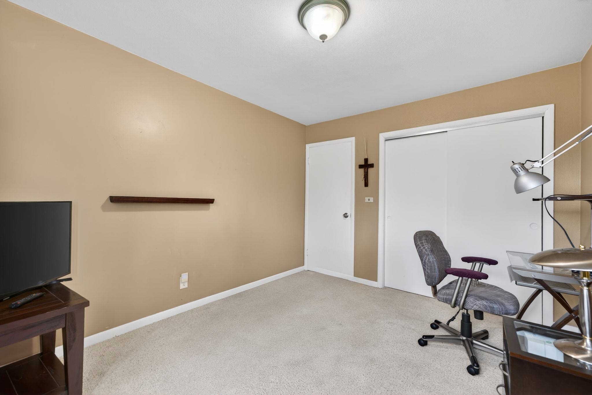 7681 Mill Road Rockford, IL 61108 - Photo 34 of 43 a view of a workspace with furniture and a window