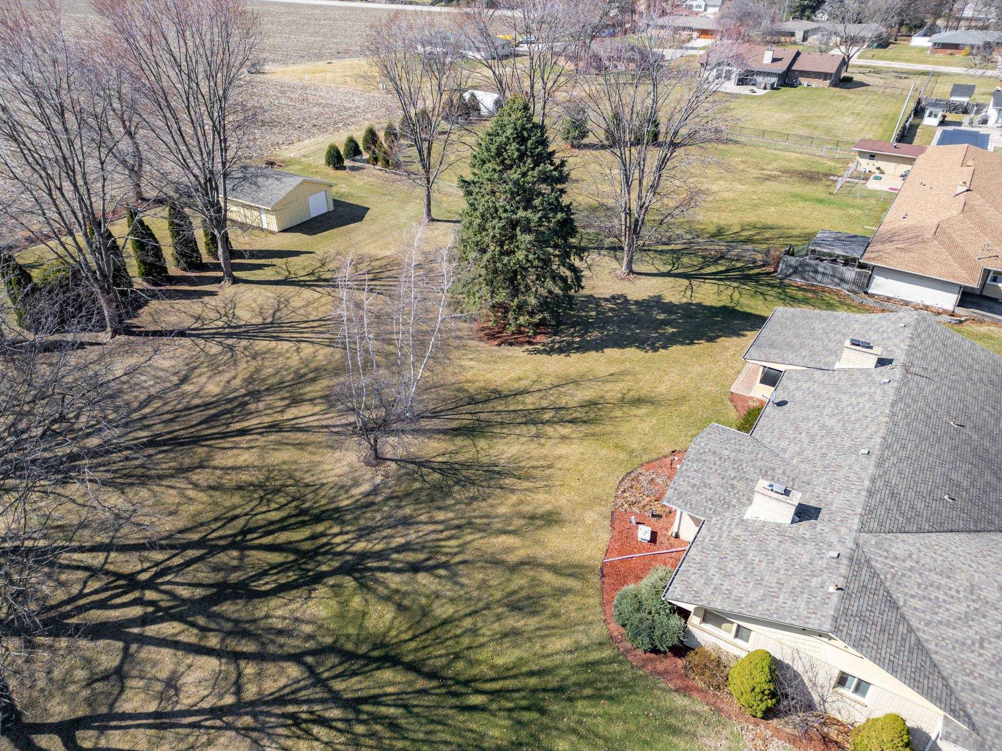 7681 Mill Road Rockford, IL 61108 - Photo 40 of 43 an aerial view of residential houses with outdoor space