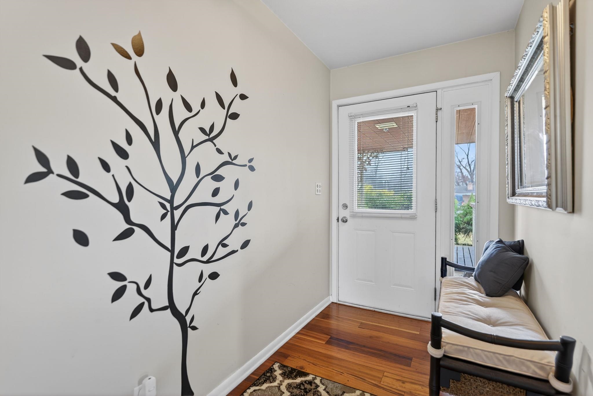 7681 Mill Road Rockford, IL 61108 - Photo 7 of 43 a view of a workspace with furniture and a window