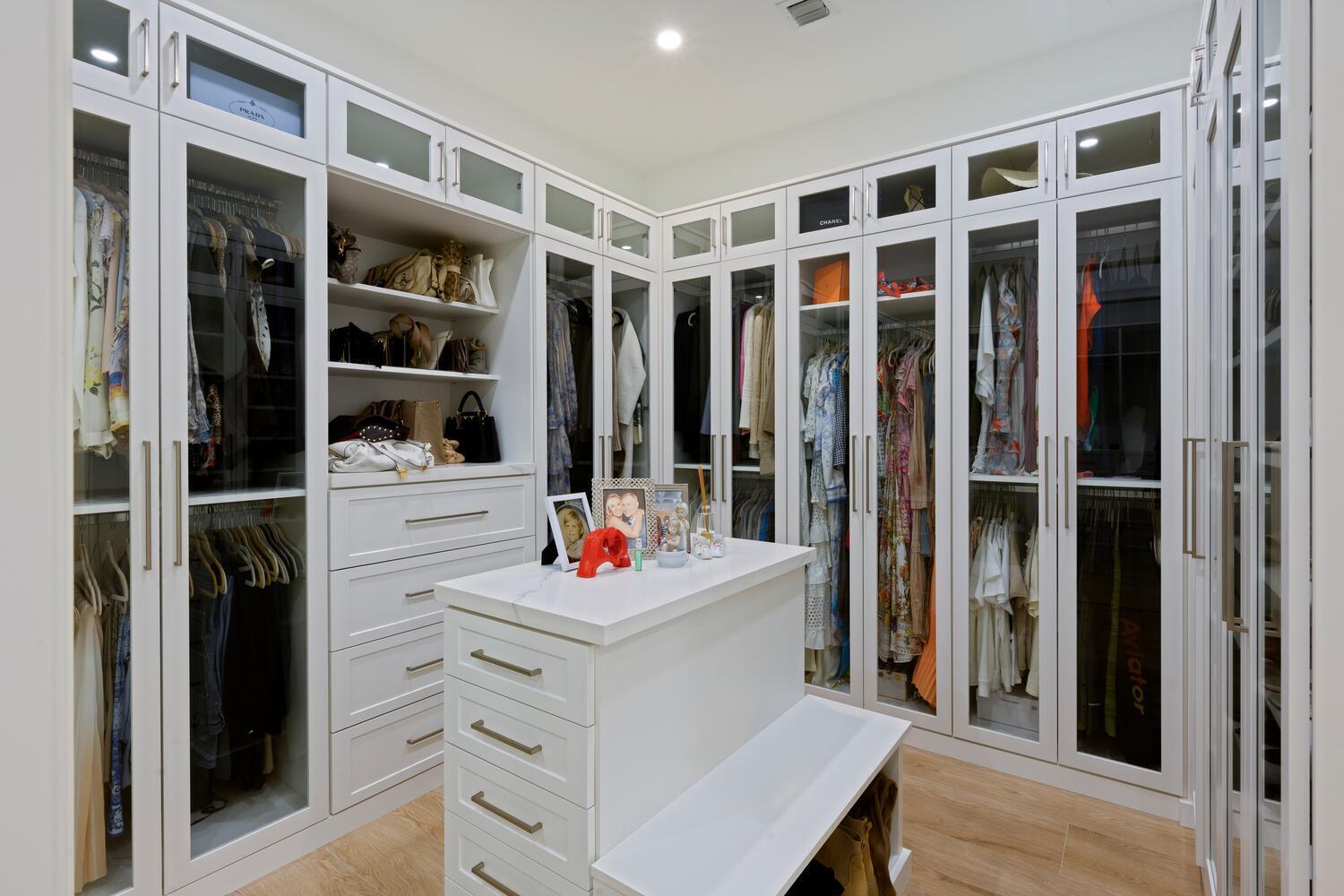 643 Pilot Road North Palm Beach, FL 33408 - Photo 17 of 73 PRIMARY HERS CLOSET - 1ST FLOOR