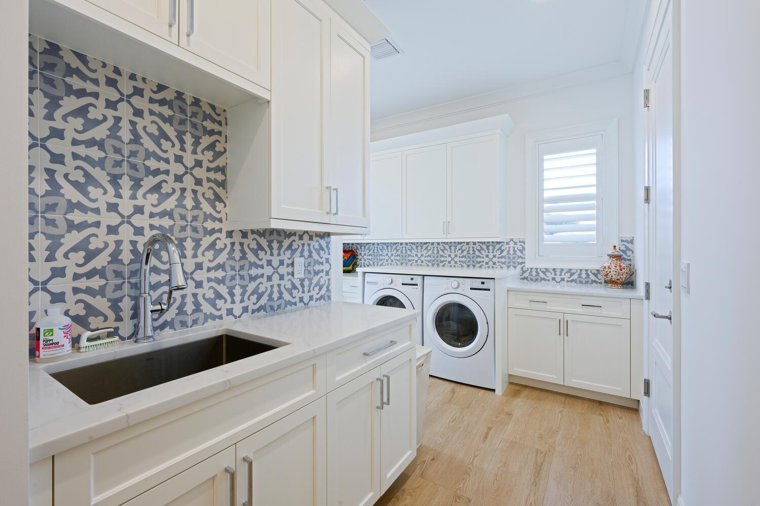 643 Pilot Road North Palm Beach, FL 33408 - Photo 22 of 73 LAUNDRY - 1ST FLOOR