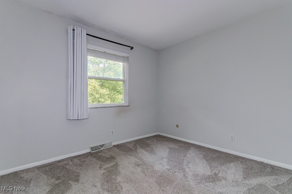 2969 Gale Road Willoughby, OH 44094 - Photo 11 of 46 Empty room featuring carpet floors and baseboards