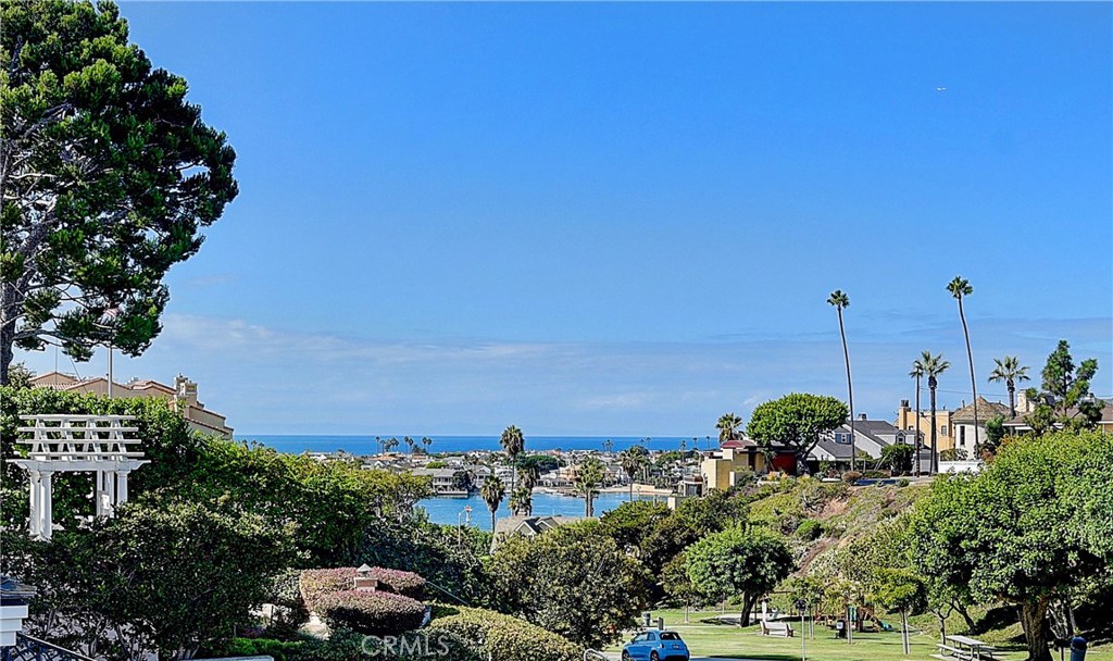 418 Carnation Avenue Corona del Mar, CA 92625 - Photo 1 of 29 a view of a houses with a yard