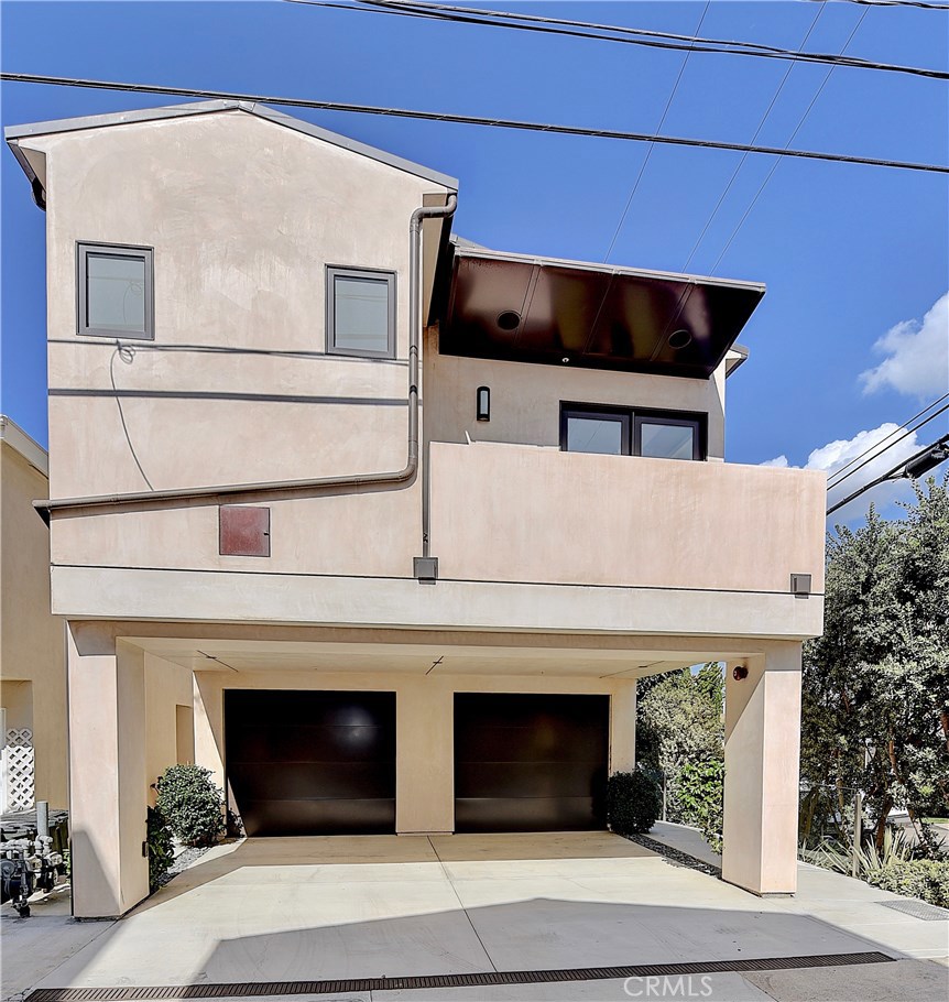 418 Carnation Avenue Corona del Mar, CA 92625 - Photo 29 of 29 a house with a outdoor space