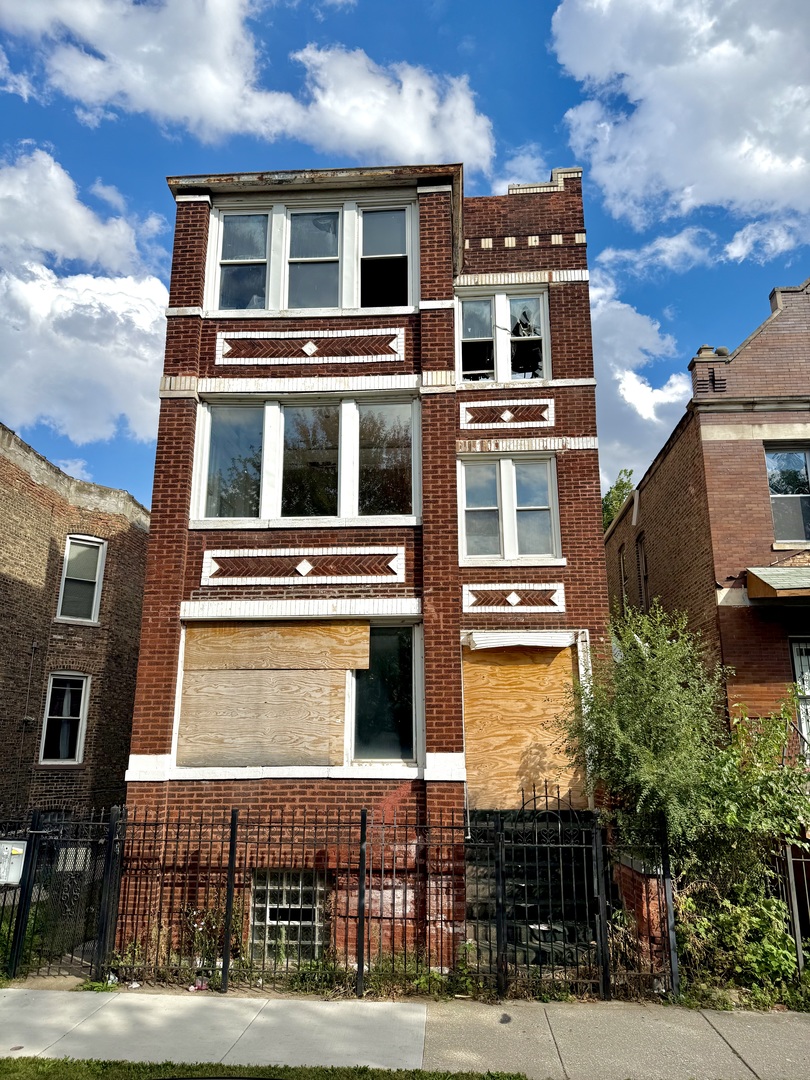 1839 South Springfield Avenue Chicago, IL 60623 - Photo 2 of 7 a front view of a building