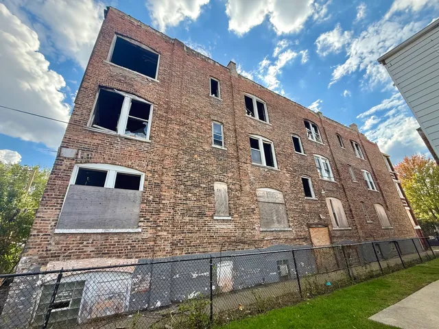 a front view of a house with yard