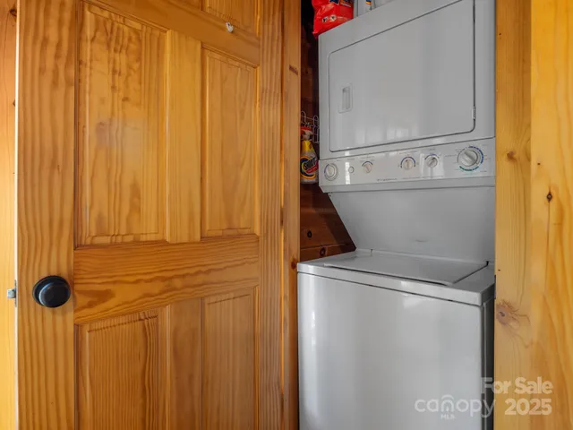 a close view of a utility room with dryer and washer