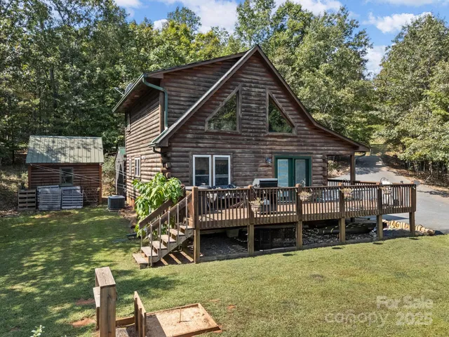 a view of a house with a yard porch and sitting area