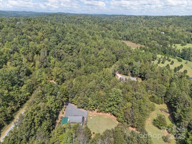 a view of a field with an outdoor space
