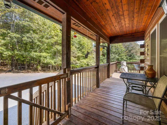 a view of a two chairs in the balcony