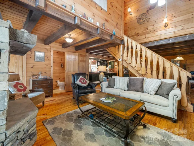 a outdoor living with furniture and a rug