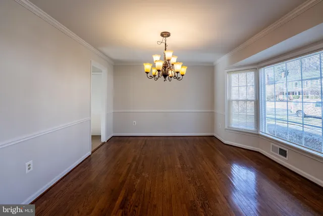 a kitchen with a refrigerator sink and microwave