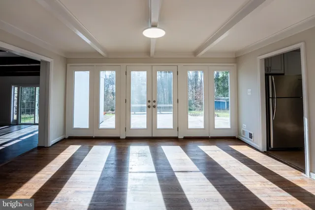 a view of entryway with wooden floor