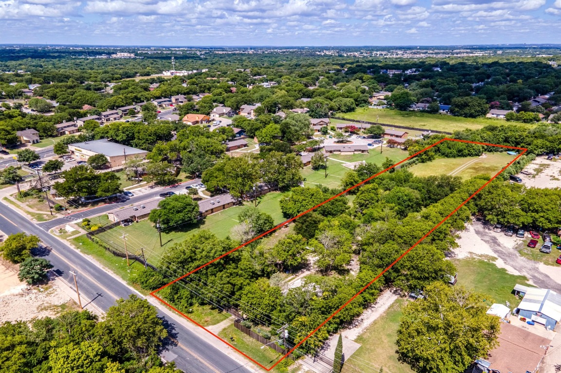 4904 Nuckols Crossing Road Austin, TX 78744 - Photo 5 of 10 an aerial view of residential houses with outdoor space and trees