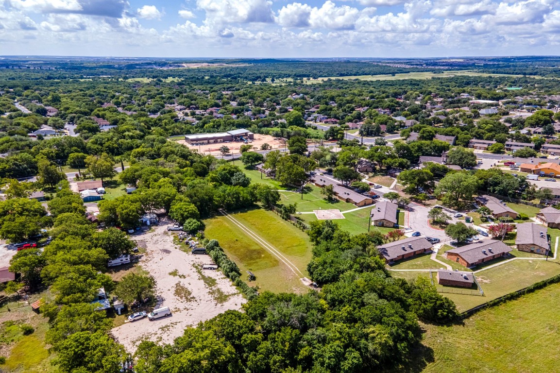 4904 Nuckols Crossing Road Austin, TX 78744 - Photo 9 of 10 an aerial view of residential house with outdoor space and trees all around