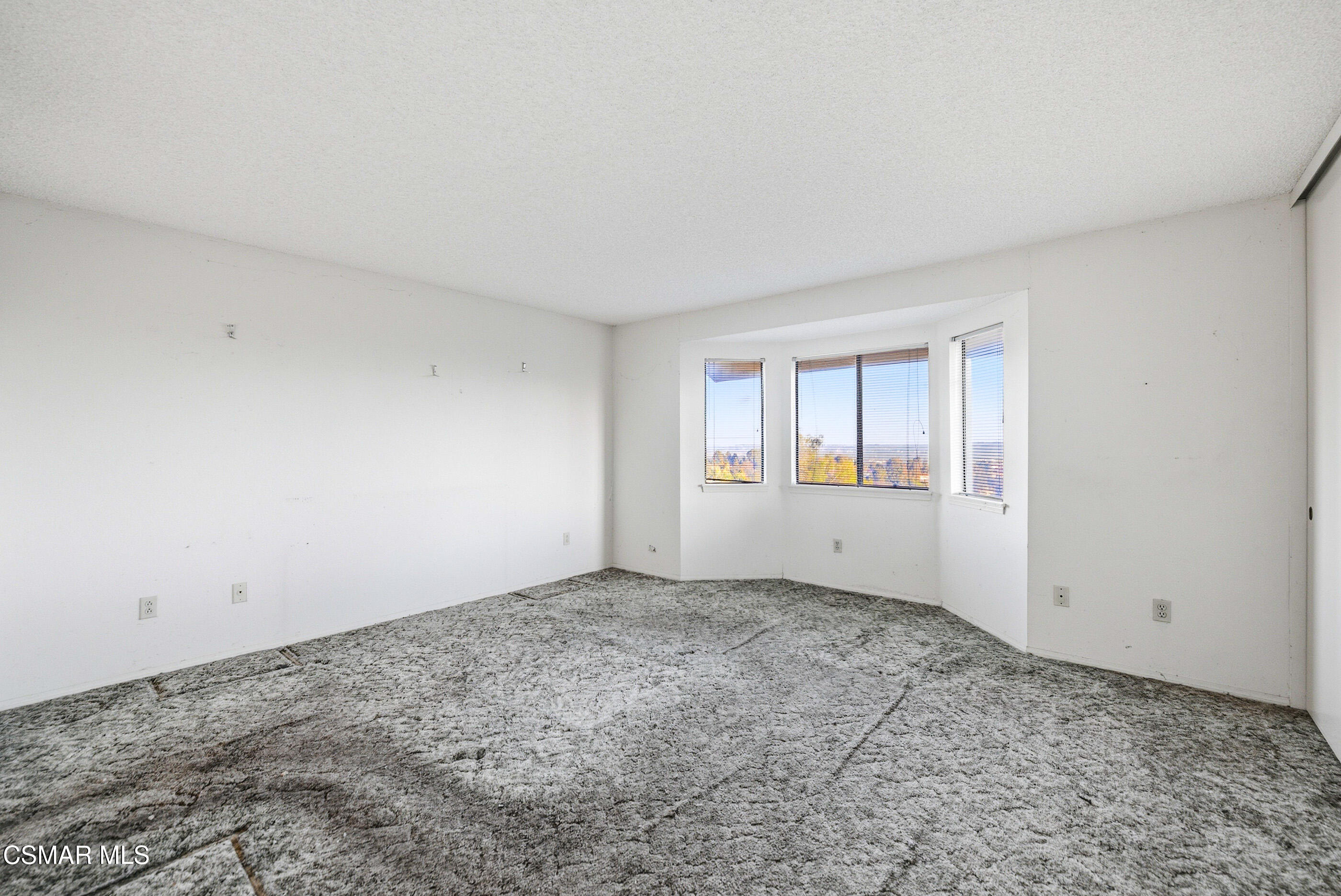 12036 Shadow Ridge Way Porter Ranch, CA 91326 - Photo 23 of 35 a view of an empty room and window