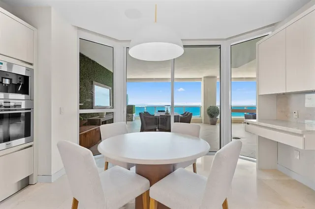 a bedroom with a bed and a table