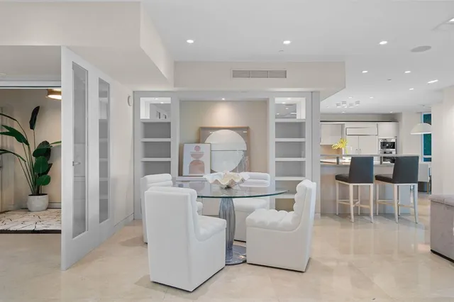 a bathroom with a toilet sink and shower