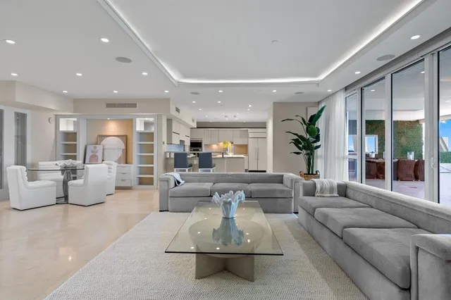 a kitchen with a sink and refrigerator