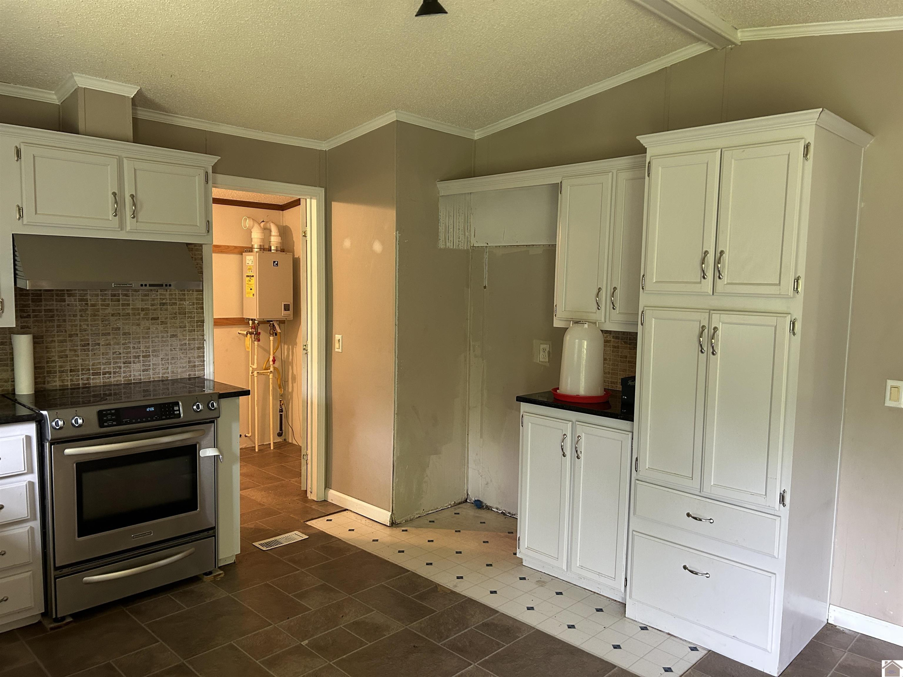 142 Frankfort Road Benton, KY 42025 - Photo 12 of 27 KITCHEN INTO LAUNDRY