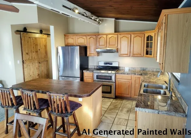 a kitchen with stainless steel appliances granite countertop a sink a stove and a refrigerator
