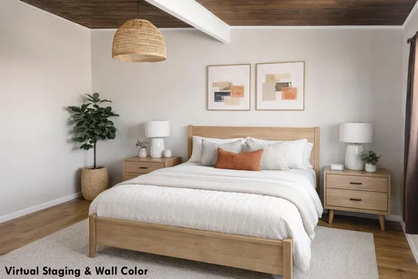 a bedroom with bed and a night stand