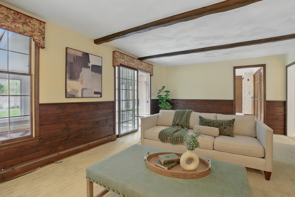 14 Harvard Drive Bedford, MA 01730 - Photo 12 of 40 a living room with furniture and a large window