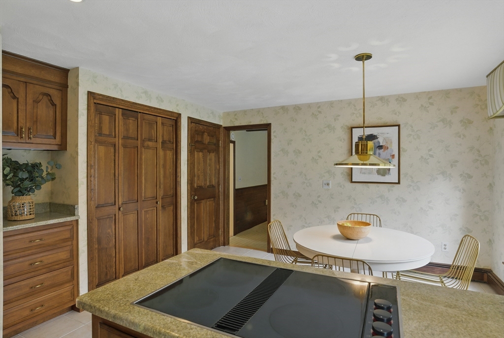 14 Harvard Drive Bedford, MA 01730 - Photo 18 of 40 a view of a livingroom with furniture and window