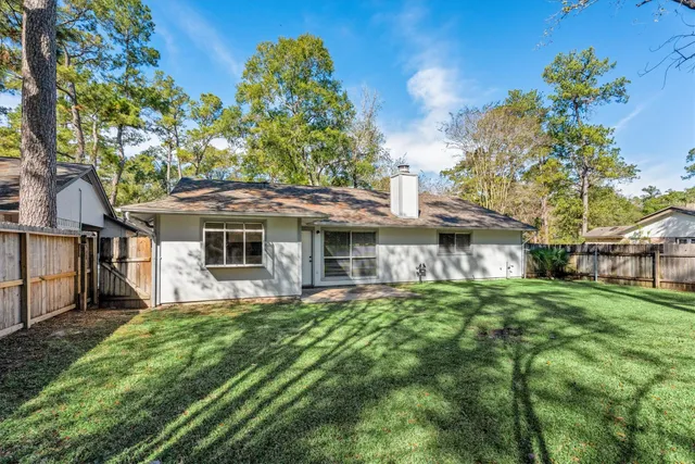 a view of a house with a garden