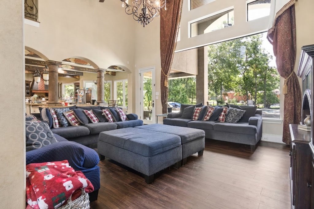 3818 Waterbend Cove Spring, TX 77386 - Photo 6 of 44 a living room with furniture and a large window