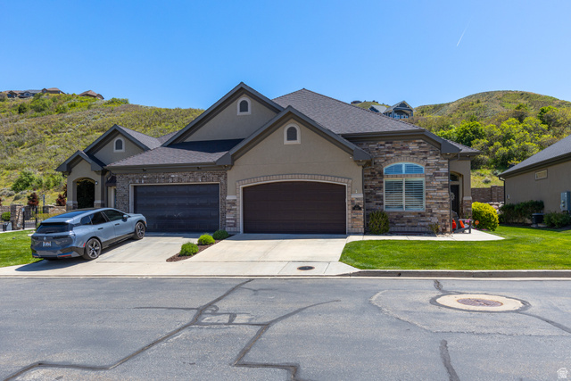 1132 Sunset Dunes Way Draper, UT 84020 - Photo 33 of 35 Stucco and stone facade with a dark gray shingle roof